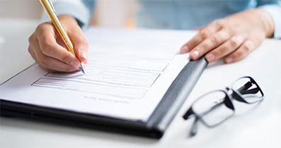 Person Filling Out Form